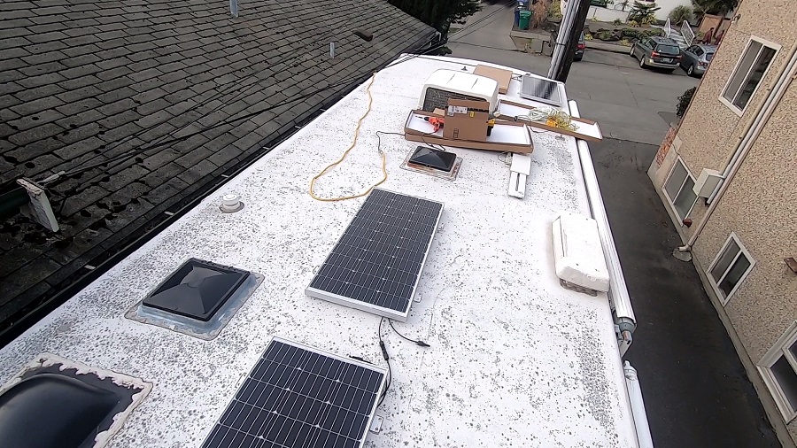 Solar panels being installed on an RV roof